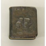 An Edwardian miniature Common Prayer book with silver cover embossed with angel heads, London 1909