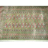 A small green and red rug.