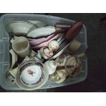 A box of assorted ceramics including plates, candlestick holders etc.