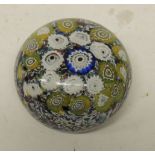 A 20th Century glass paperweight with millefiori design, approx 8cms diam