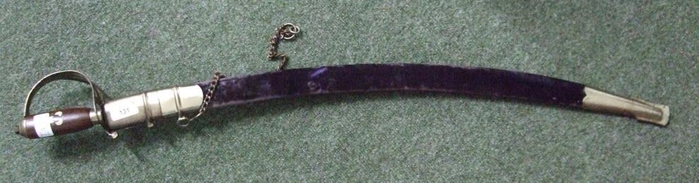 A decorative sword and scabbard.