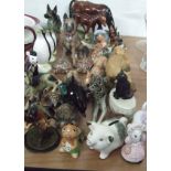 A USSR Alsatian together with a quantity of assorted figurines.