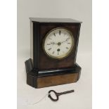 A late Victorian mantel timepiece by S Marti & Cie having white enamel dial and in wood case, with
