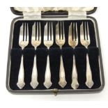 A cased set of six silver cake forks, total weight 3.3ozt