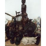 A quantity of assorted wooden items including tribal figures; animals etc.