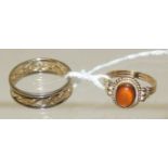 A 9K gold ring, set with a cabochon amber coloured stone, size O; and another 9ct white and yellow