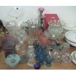 A quantity of assorted glassware including vases, cake stand etc.