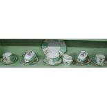 A Royal Crown Derby mint and white teaset.