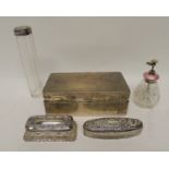 A sterling silver and pink enamel mounted glass atomiser; two silver topped glass trinket boxes, a