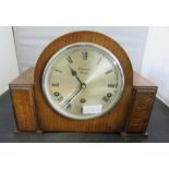 A J W Benson oak cased mantle clock.