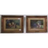 A pair of gilt framed prints.