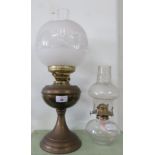 An oil lamp with frosted glass shade, together with an all glass oil lamp (2).