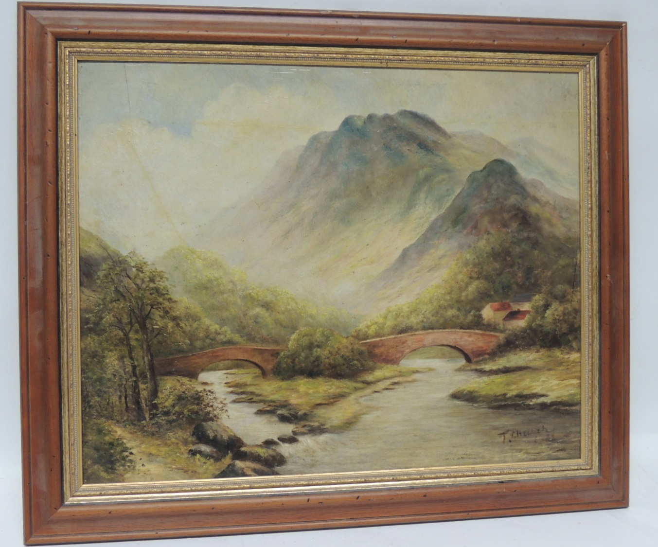 LATE 19TH CENTURY ENGLISH SCHOOL - Mountainous scene with bridge over a river, oil on board,