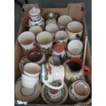 A quantity of mottoware to include tankards, coffee pots, jugs, etc.