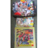 A quantity of assorted McDonalds toys, boxes and display boards.