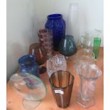 A moulded blue glass vase together with eight other assorted glass vases etc.