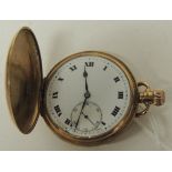 A Gents 9ct gold cased, full hunting pocket watch, manual wind, the white enamel dial with black