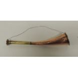 A late 19th/ear;y 20th Century copper and brass hunting horn of slightly curved form, 23cms long, no