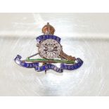 A 9ct gold enamelled and platinium "Royal Artillery" sweetheart brooch, the canon wheel set with