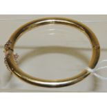 A gold (tested) hollow circular bracelet, the catch marked 750 NOTE: maybe a lower carrat than