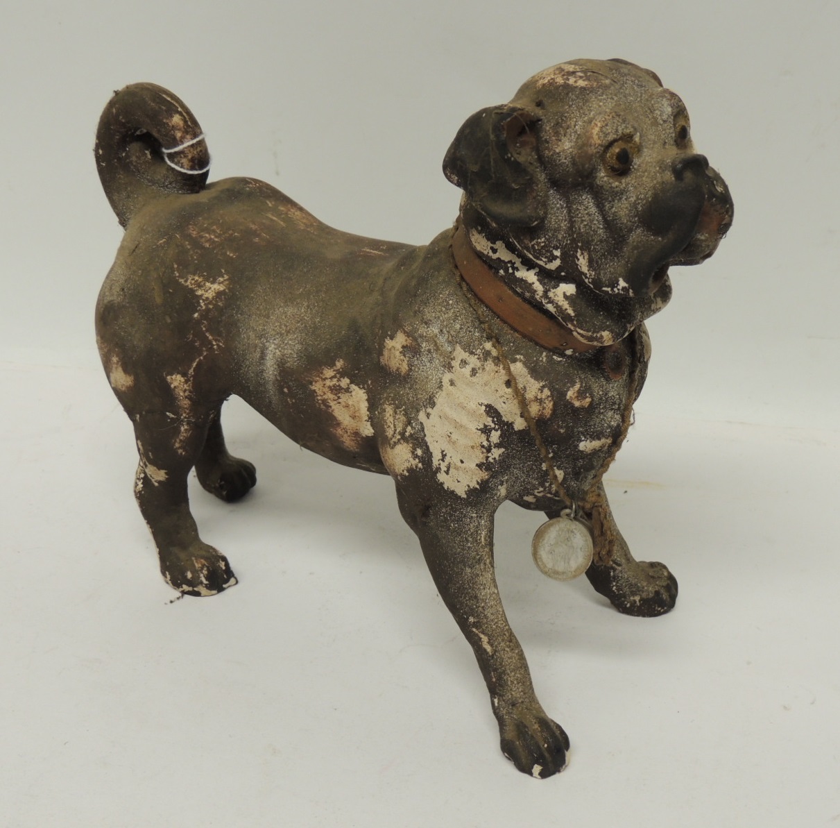 A 19th Century painted plaster model of a standing pug, 22cms high