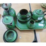 A green iridescent glazed Watcombe pottery tea set for one, together with coffee pot, etc.