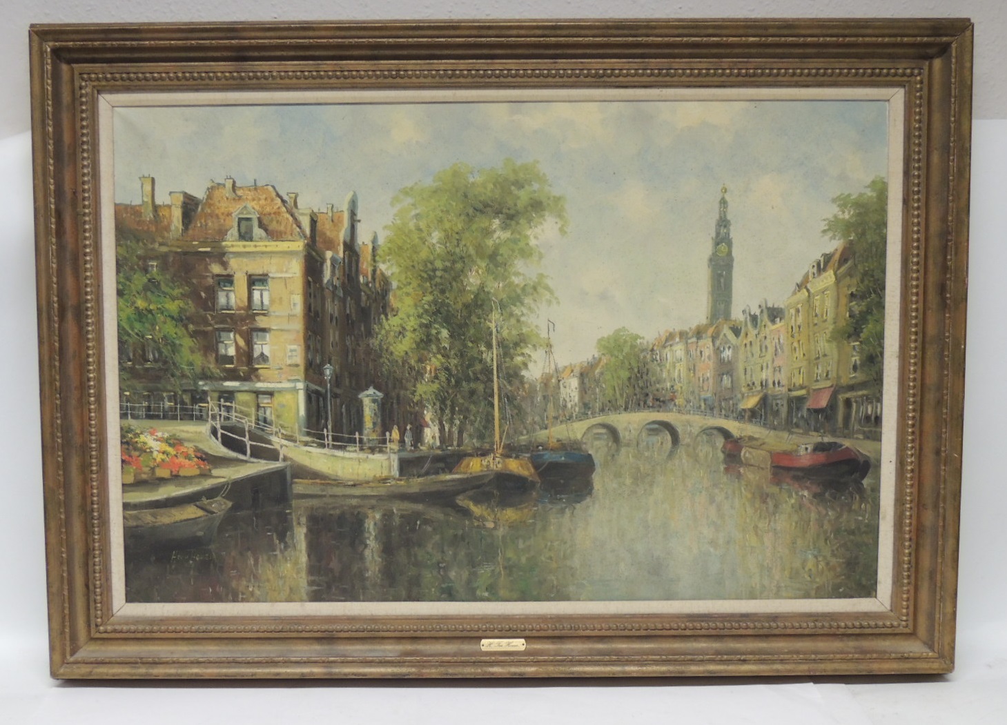 H TEN HOVEN (20th Century) - Amsterdam canal scene, oil on canvas, signed, 55cms x 84cms