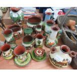 A Watcombe pottery planter decorated with a country scene, together with other items of pottery