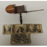 A Victorian hand held stereo viewer together with a number of Excelsior Stereoscopic Tours cards