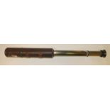 A Hillary Everest 25x - 40x two draw brass telescope with brown leather covered barrel, 52cms long