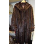 A ladies brown fur coat