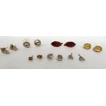 Seven matched pairs of stud earrings to include 9ct and 18ct gold.