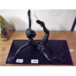 A Tom Merrifield, bronze figure of a naked lady laying down, signed and numbered 8/8