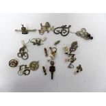 A watch makers key along with a small amount of miscellaneous items of mixed metal to include gold.