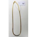 A yellow and white gold snake chain necklace stamped 750, weight approx 8.3g.