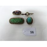 An 8ct gold brooch marked 333, two silver and gilt filigree brooches and a hand painted lacquered