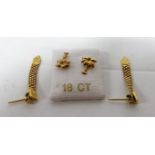 Two matched pairs of 18ct gold earrings to include a pair of palm tree studs and a pair of drop