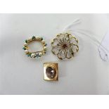 An 18ct gold pearl and turquoise scarf clip/brooch together with two 9ct gold brooches.