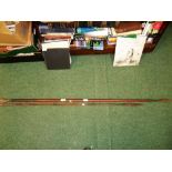 A doubled ended African Spear with plain woodshaft, 162cm long, together with another African