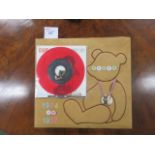 Elvis Presley scrapbook with a 45 record titled Teddy Bear c/w Loving You