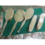 Five piece hallmarked silver and green leather dressing table set