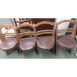 Four oak arts and crafts seats with red leather seats