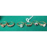 Four 9ct gold gem set rings, makers mark GTV Birmingham, with three rings sized R, the other S,