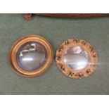 Two circular gilt mirrors