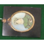 Late 18th/early 19th century portrait miniature of a lady dressed in a green dress with headress and