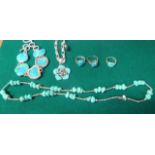 A collection of turquoise and turquoise matrix jewellery, to include two necklaces, a bracelet,