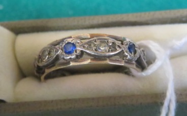 A marked 9ct and SIL, blue and white sapphire eternity ring, ring size P, weight 2.6g