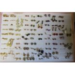 Collection of over seventy-seven matched pairs of earrings, some marked 9ct, with many gem set to
