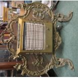 Ornate brass framed fire screen with later added fire