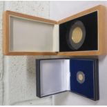 Two London Mint Office cased coins to include, Saint George and the Dragon, five pound coin,